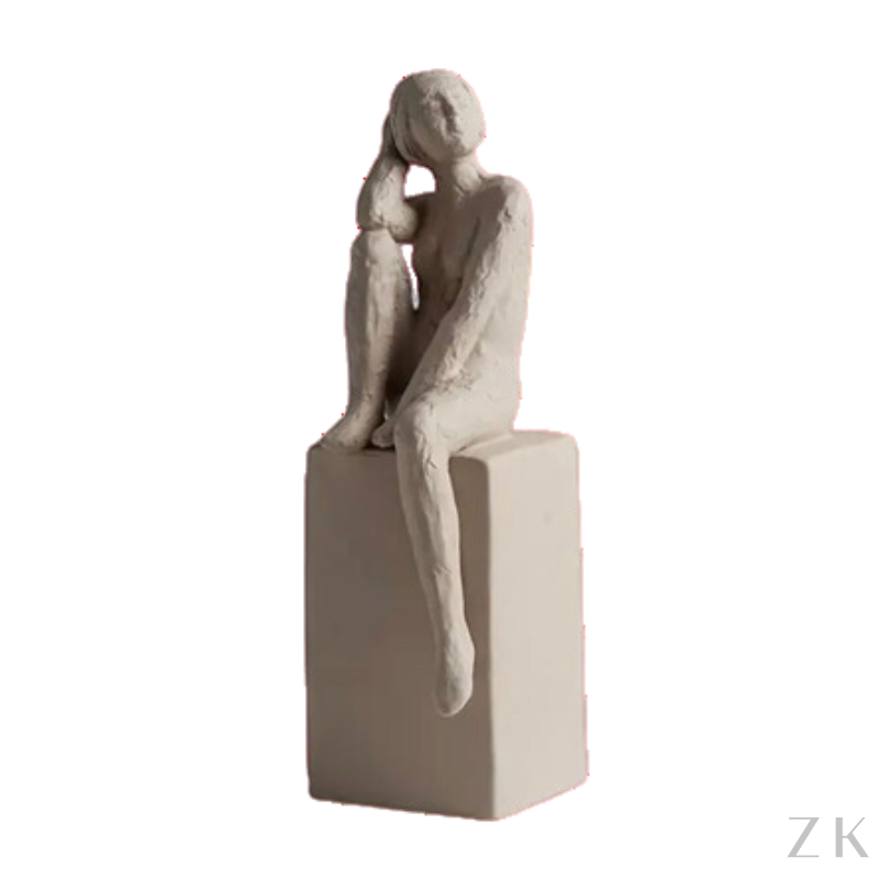 ESCULTURA MENINA SENTADA 